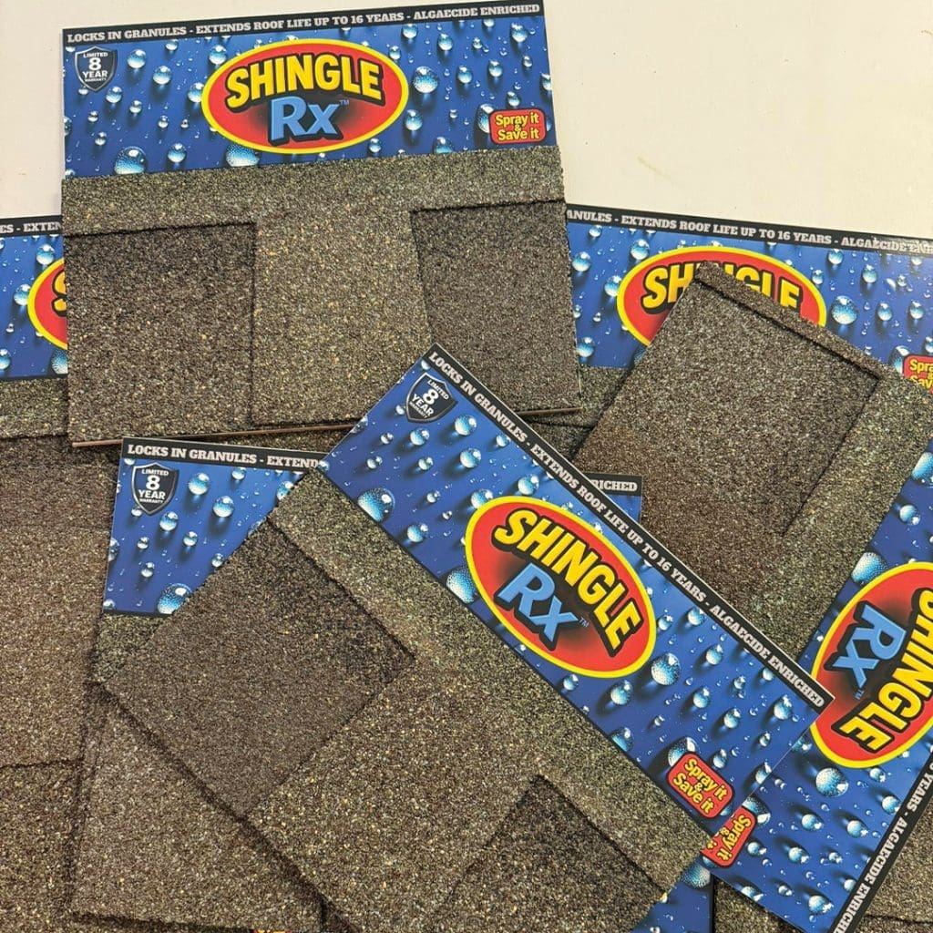 Multiple Shingle RX roof sealer brochures fanned out on asphalt shingle samples showing granule protection and 8-year warranty