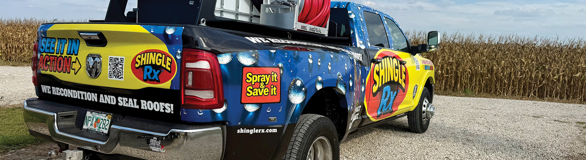 Shingle RX branded service truck with roof rejuvenation equipment parked under wide open sky representing Central Florida roof rejuvenation service