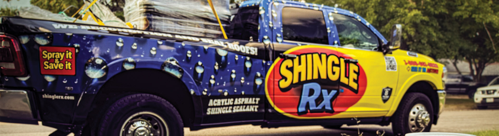 Shingle RX branded service truck with product buckets on Florida job site representing customer reviews and roof rejuvenation results